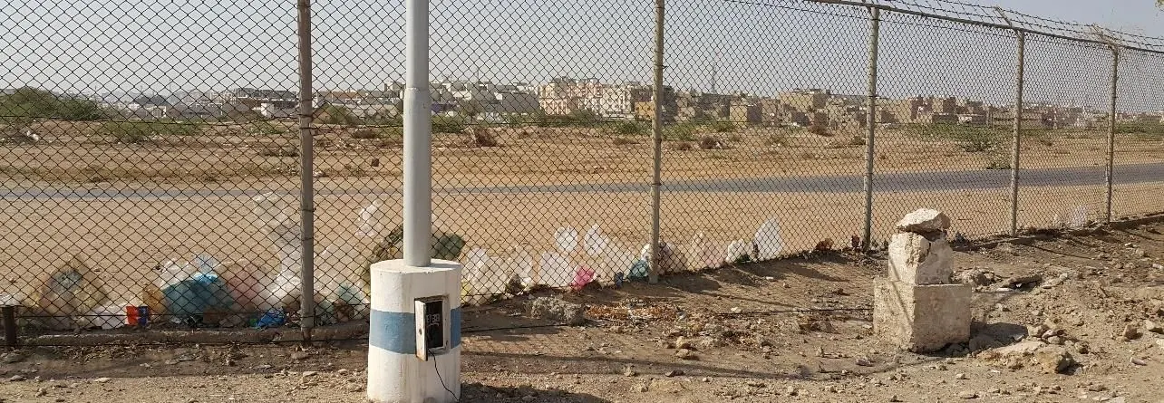 Plastic bags caught on the western perimeter fence
