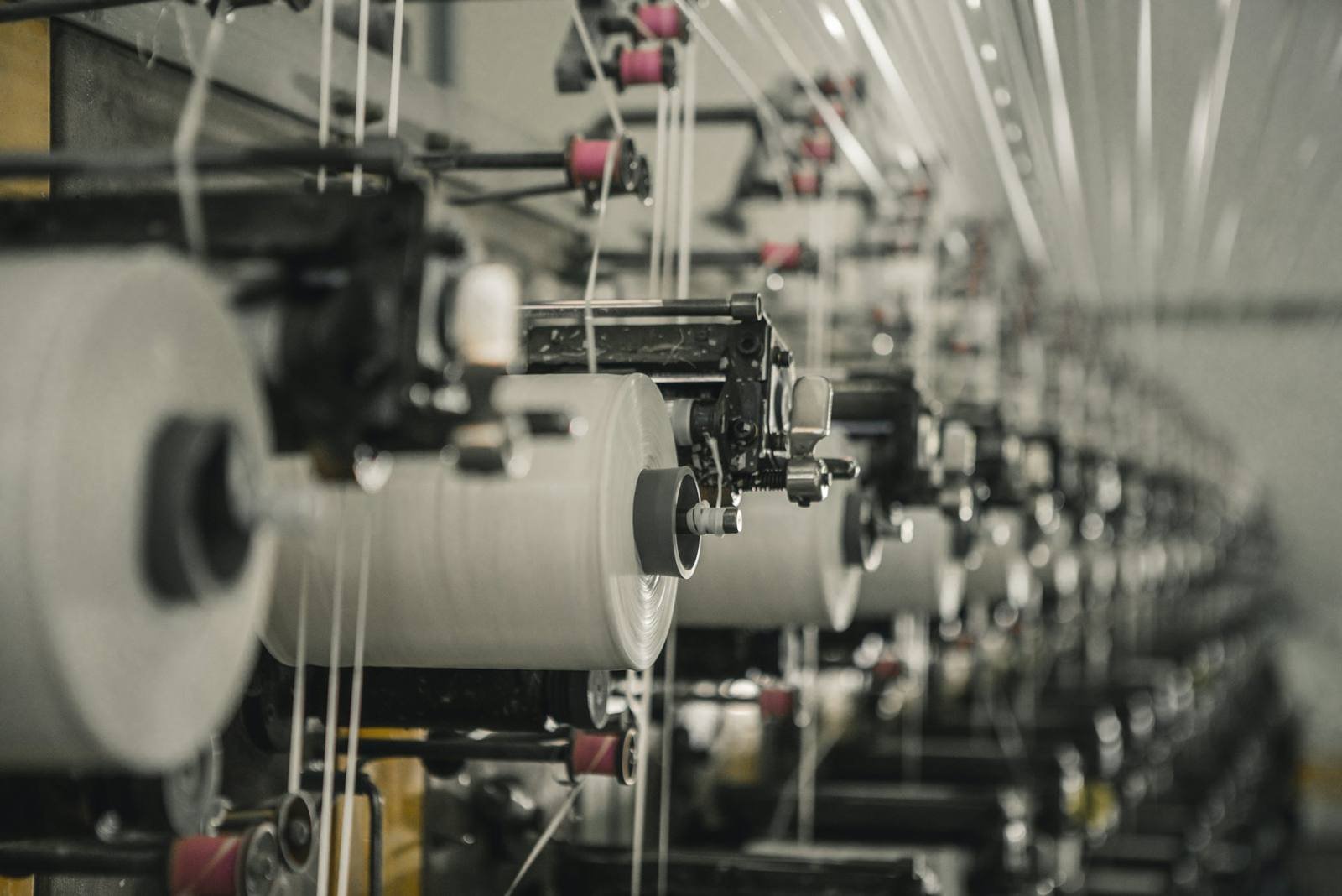 Yarn packages on an industrial winding machine
