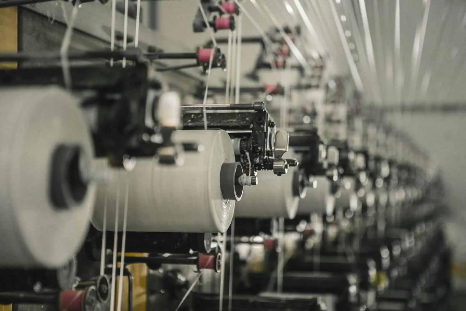Yarn packages on an industrial winding machine